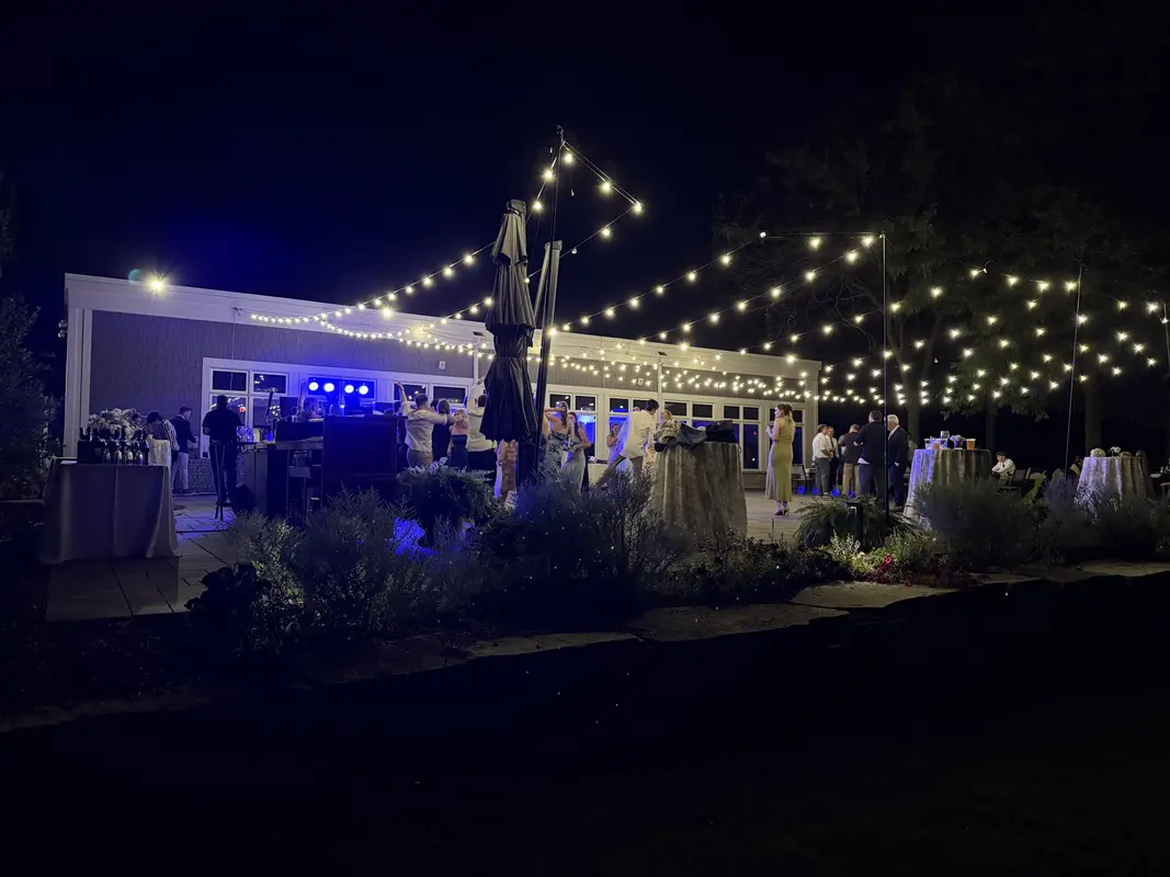 Moving head light beams with purple haze effect at a birthday party