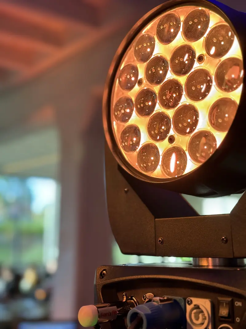 Moving head wash light closeup at a wedding reception