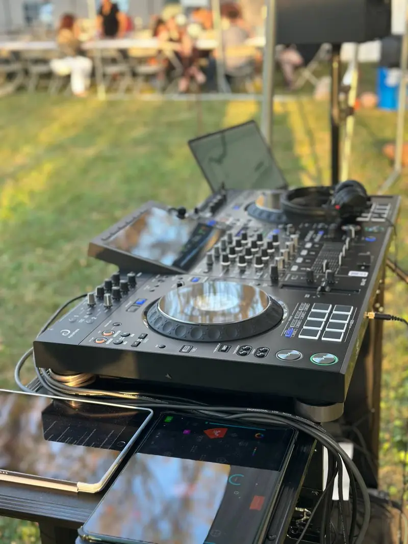 Professional DJ controller setup at an outdoor event in Minnesota